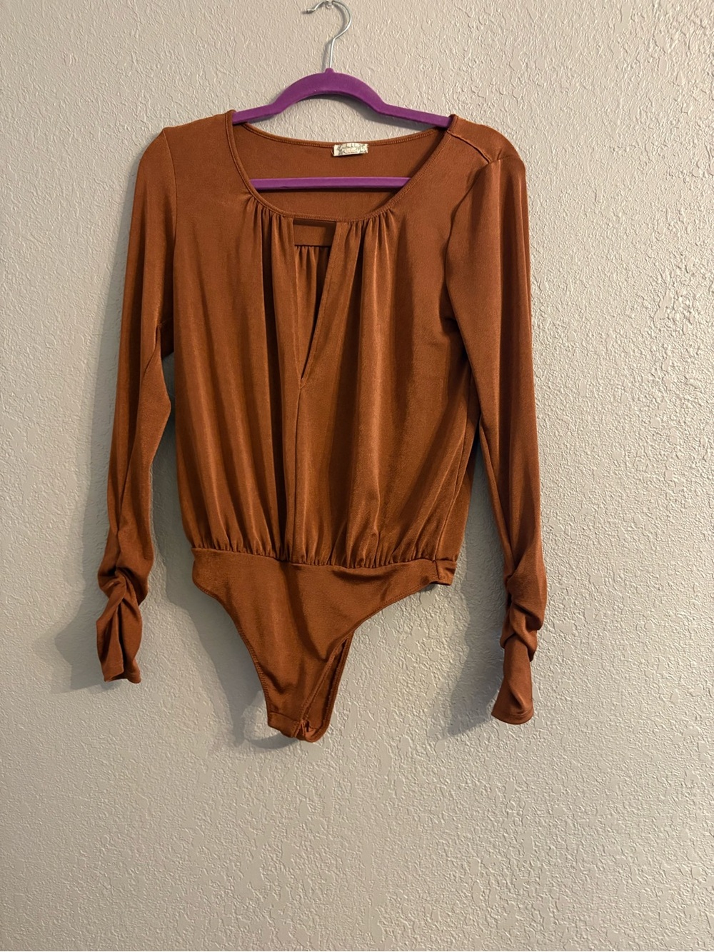 Free People Long-Sleeve Bodysuit in Brown Rust Color